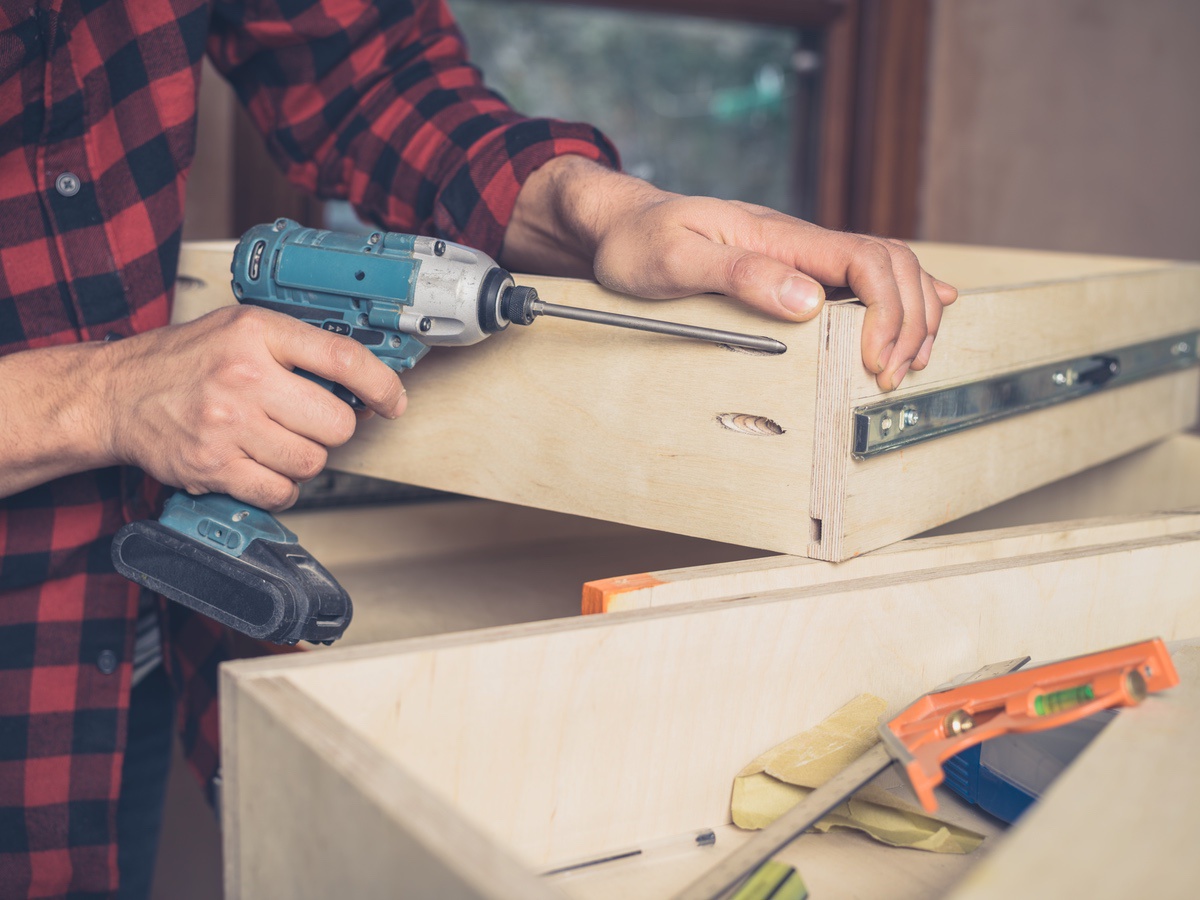 Cabinet drawer assembly and hardware installation