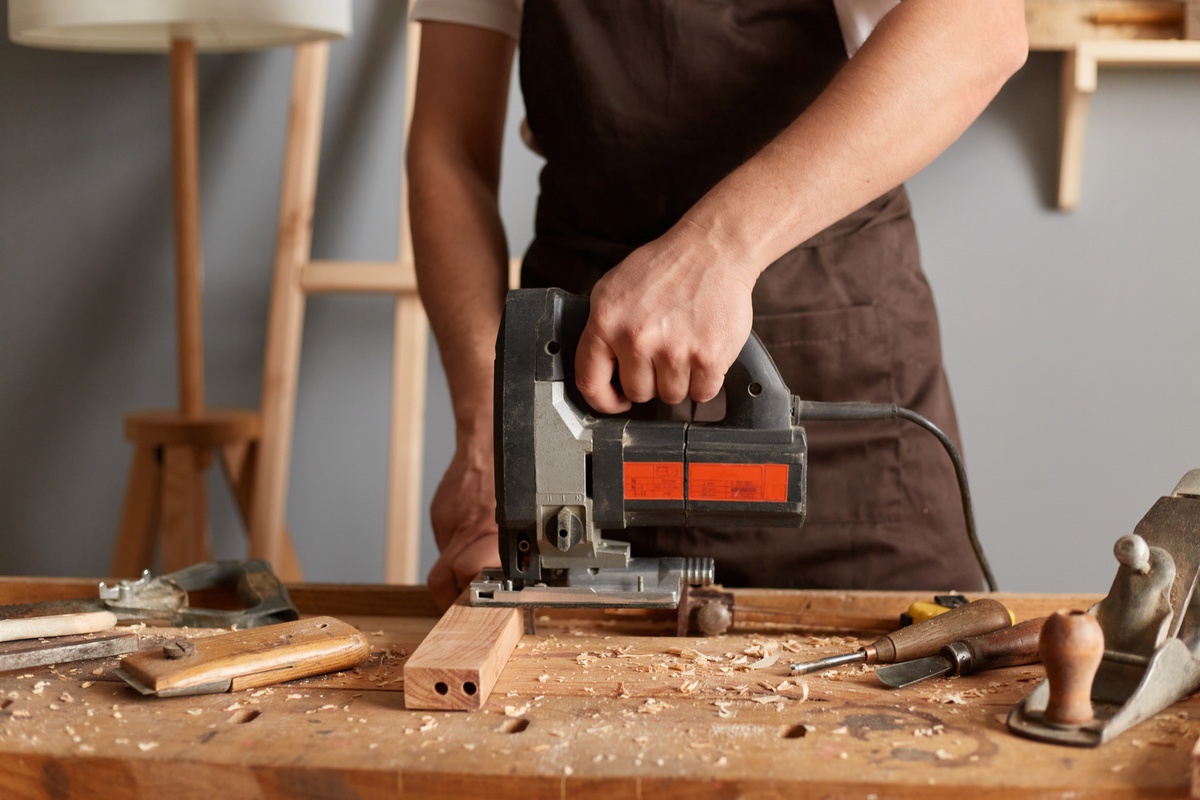 Cutting cabinet components in the workshop